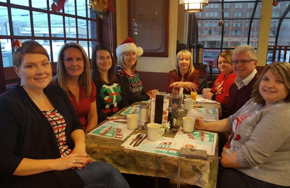 Some of the PSCU staff celebrate the beginning of the Christmas break; breakfast at Ches's, yummy!