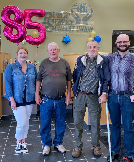 Long-time members Michael Grace and Joseph Rice along with employees Joanne Cooper and Kostadin Manolov sharing in the 85th celebrations.